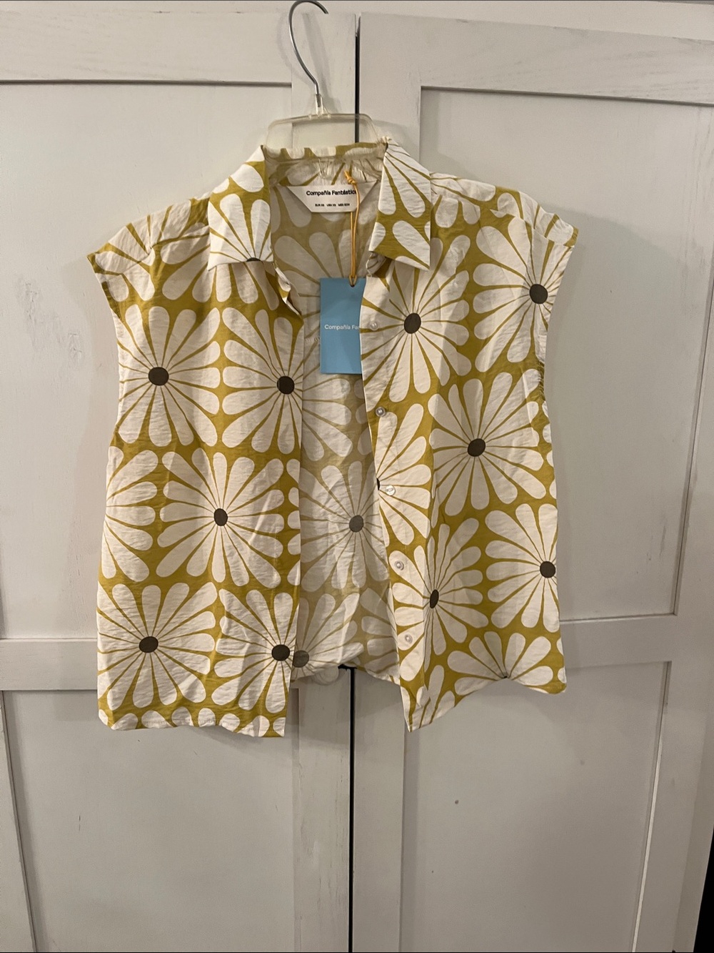 Sleeveless Button-Down Shirt in Mustard Daisy Print by Compania Fantastica